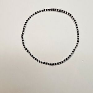 Black and clear beaded bracelet.